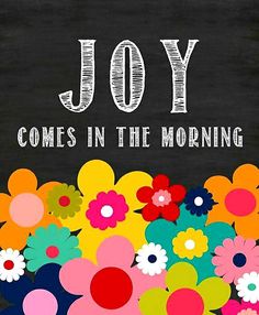 the words joy comes in the morning written on a chalkboard surrounded by colorful flowers