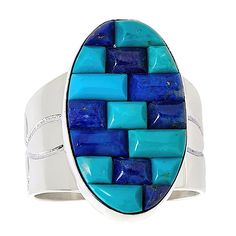 Jay King Sterling Silver Turquoise and Lapis Inlay Oval Ring  A three-dimensional, corn-row inlay of beautiful blue turquoise and lapis stones provide an artistic blend of texture and color to this handcrafted sterling silver ring. From Jay King.       Approx. 13/16"L x 3/4"W x 3/16"H; shank 3/16"W     Stamped .925     Sterling silver wide-band ring has oval-shaped top with 3-dimensional corn row inlays of rectangular blue turquoise and blue lapis     Tapered shoulders have decorative stamp work Modern Blue Multi-stone Jewelry, Southwestern Multi-stone Turquoise Ring, Oval Blue Multi-stone Turquoise Ring, Southwestern Blue Oval Bracelets, Southwestern Blue Turquoise Ring With Natural Stones, Southwestern Style Blue Turquoise Ring With Natural Stones, Southwestern Blue Oval Jewelry, Southwestern Style Blue Oval Jewelry, Oval Blue Southwestern Jewelry