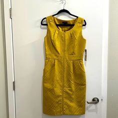 Tahari Mustard Yellow/ Chartreuse Sleeveless Dress With Pockets. Easy Day To Evening Piece. Dress Up Or Down. Unique And Tasteful. Zipper Front. Modern Brocade Textured Fabric. Lined. Nwt Size 8 Approx Measurements 39-31-42. Length 38 Inches Elegant Yellow A-line Sleeveless Dress, Yellow Sleeveless Midi Dress For Party, Fitted Yellow Sleeveless Dress, Chic Yellow Knee-length Sleeveless Dress, Mustard Sleeveless Party Dress, Sleeveless Mustard Dress For Party, Elegant Yellow Sleeveless Maxi Dress, Yellow Sleeveless Beach Dress, Yellow Sleeveless Mini Dress For Spring