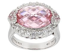 Indulge in the enchanting allure of romance with this exquisite Judith Ripka Pink & White Cubic Zirconia Rhodium Over Sterling Silver Romance Ring. The delicate fusion of white and pink cubic zirconias, totaling an impressive 13.75 carats combined, creates a mesmerizing symphony of elegance on your finger. Crafted by renowned designer Judith Ripka, this stunning ring is a true masterpiece that exudes sophistication and charm effortlessly.  The sterling silver band showcases intricate details tha Elegant Pink Diamond Ring In Platinum, Elegant Pink Sterling Silver Diamond Ring, Luxury Diamond Ring With Gemstone For Valentine's Day, Elegant Pink Platinum Rings, Elegant Pink Ring With Diamond Accents, Elegant Pink Diamond Ring With Diamond Accents, Elegant Pink Diamond Ring With Accents, Elegant Round Diamond Ring For Valentine's Day, Formal Jewelry With Accent Stones For Valentine's Day