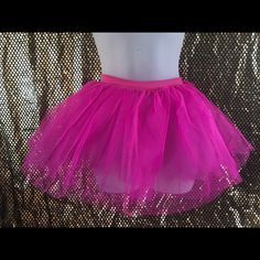 a pink tutu skirt on a mannequin