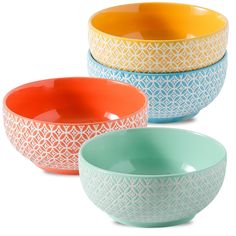 three bowls with different designs on them