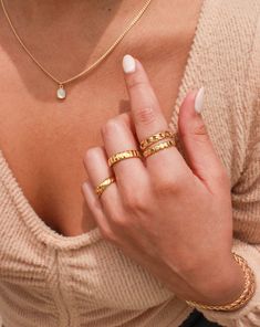 Introducing the Katya Ring, a must-have for every jewelry lover! Designed for everyday wear, this waterproof ring will effortlessly elevate your ring stack. Made with a durable PVD plating finish, our ring collection offers not just style, but also longevity. Treat yourself or surprise someone with this piece! • Gold Plated Stainless Steel (PVD Plating)• Size Options: US 6 - 8 Stacking Gold Rings, Waterproof Rings, Everyday Wear Jewelry, Minimal Look, Ring Stack, Linking Rings, Just Style, Ring Collection, Gold Ring Stack