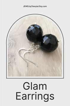 These handcrafted black onyx earrings are simply stunning! Silver fish hooks featuring a large 18mm round faceted black onyx gemstone and measuring 1.5 inches in length. Perfect for any formal occasion! Black Faceted Jewelry As A Gift, Black Faceted Jewelry For Gift, Classic Round Onyx Earrings, Faceted Round Onyx Jewelry, Classic Onyx Round Earrings, Black Faceted Jewelry For Party, Elegant Black Faceted Earrings, Black Faceted Earrings As A Gift, Faceted Black Earrings Gift