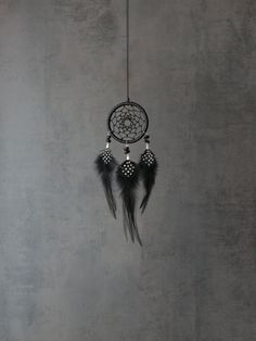 Black dream catcher whith agate beads Black dream catcher for car I wrapped a metal hoop with black PU leather cord. The web is woven with a black smooth cord. The bottom flows made of black color goose feathers, guinea fowl small feathers and agate beads. This small dream catcher looks great as hanging over a car rear view mirror. This dreamcatcher can an excellent decoration for your home also, and an excellent gift for family members or friends.. Size: diameter 2,3" (6 cm) lenght 9,4" (24 cm) Dream Catcher Black, Dream Catcher For Car, Black Dream Catcher, Small Dream Catcher, Guinea Fowl, Chinese Knot, Car Rear View Mirror, Color Calibration, Agate Beads