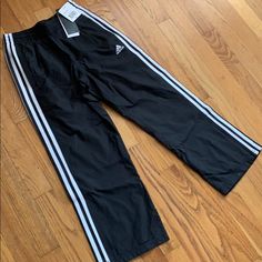 Adidas Nylon Training Pants, Boys S, Nwt. Elastic Waist With Drawstring. Perfect Condition. Black Nylon Adidas Bottoms, Adidas Black Nylon Bottoms, White Nylon Athleisure Pants, Adidas Sports Nylon Pants, Adidas Nylon Sports Pants, Casual White Nylon Parachute Pants, White Nylon Long Pants, Casual Adidas Nylon Pants, Casual Nylon Adidas Pants