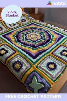 a crocheted bed with a starfish on it and the words viola blanket above it