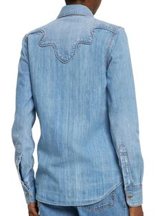 Crafted from premium stonewashed cotton denim with two front pockets and button cuffs, this embroidered shirt is begging to be featured in your next Instagram post. Subtle floral embroidery accents the chest for just the right amount of feminine detail, while the relaxed fit nods to laidback style. Whether paired with jeans or a skirt, this versatile top lends instant casual cool to any outfit. Multiple washes ensure no two shirts are alike, making it a unique addition to your closet and each In Womens Denim Shirt, Women's Blouses, Ermanno Scervino, Laid Back Style, Embroidered Shirt, Women's Tops, Denim Shirt, Vivienne Westwood, Manolo Blahnik