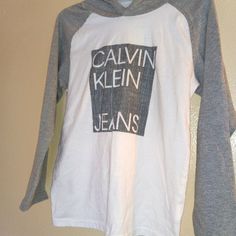 Nwt Long Sleeved Tee For Boys Calvin Klein Cotton T-shirt With Letter Print, Calvin Klein White Logo Print T-shirt, Calvin Klein Cotton Tops With Logo Print, White Short Sleeve Calvin Klein Shirt, Calvin Klein White T-shirt For Streetwear, White Calvin Klein Casual Shirt, Casual Calvin Klein Tops For Streetwear, Calvin Klein White Short Sleeve Shirt, Calvin Klein Casual Tops For Streetwear