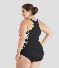 JunoActive's QuikEnergy™ Zip Tank Suit features a zipper function making the suit easier to take on and off when wet. Whether your day finds you relaxing at the beach or making waves at water aerobics, you'll love wearing this style. Pairs well with any JunoActive plus size swimwear bottoms! Imported If you are in the pool multiple days a week, we recommend purchasing AquaSport, our strongest chlorine resistant line of swimwear. Breast insert friendly bra design. High-Tech Fabric 80% Nylon/20% S Black Surfing Swimwear With Built-in Shorts, Black Sports Swimwear With Moisture-wicking, Black Moisture-wicking Swim Shorts, Black Moisture-wicking Sports Swimwear, Black Moisture-wicking Swimwear For Surfing, Tank Swimsuit, Water Aerobics, Lounge Bra, Plus Size One Piece