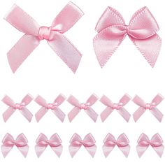 a set of pink bows and ribbons on a white background