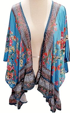 You are buying a-Umgee 3/4 Sleeve Side Slits Kimono XL/1XL 1XL/2XL Women's NWT Cyan Blue Floral Mix Style-Open Kimono Color-Cyan Blue Floral  Size-  XL/1XL or 1XL/2XL Condition-This a new and unused item with tags. Measurements-                                                          XL/1XL      Front 29      Back 33        Pit To Pit 39"                                                                                          1XL/2XL    Front 30      Back 34        Pit To Pit 40" Casual Blue Long Sleeve Kimono, Blue Floral Print V-neck Kimono, Bohemian Summer Kimono With 3/4 Sleeves, Blue Floral Print Long Sleeve Kimono, Blue Long Sleeve Kimono With Floral Print, Blue Free Size Kimono With Kimono Sleeves, Blue Flowy Kimono For Festival, Flowy Blue Kimono For Festival, One Size Blue Floral Print Kimono