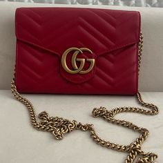 Gucci Authentic Red Purse With Metal Strap. Used Only Once. Excellent Condition. With Dust Bag. Serial Number Provided In Pictures. Size Is 8"W X 5"H X 2.5"D Red Purse, Red Purses, Metal Straps, Gucci Bags, Gucci Bag, Bags Women, Dust Bag, Bag Lady, Like New