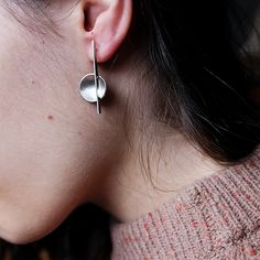 These architectural earrings are the combination of a dome and a silver bar. They are made of sterling silver in my workshop in Madrid (Spain). The minimalist jewelry is perfect for your casual outfit and great as a complement for a special ocasion.   Asymmetric earrings inspired by geometrical and architectural designs. MATERIALS and FINISHES - Materials - Silver  - Posts Material - Silver - Ear Back Material - Silver - Finishes - Matte  SIZES - Length - 3,5 cm (1  3/8 inches) - Post Length - 1 Architectural Jewelry Design, Architectural Earrings, Architect Gift, Contemporary Handmade Jewelry, Architectural Jewelry, Red Heart Earrings, Edgy Jewelry, Handmade Silver Jewellery, Abstract Earrings