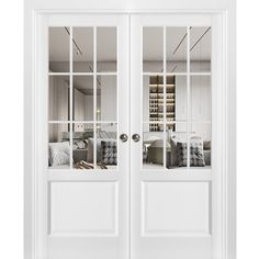 two white double doors with mirrored windows in the front and side panels on each door