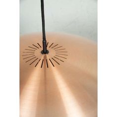 a close up view of the top of an umbrella with sunbursts on it