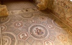 the floor is decorated with mosaics and other decorative items, including an animal on it