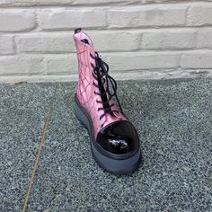 The Demonia Slacker-88 Ankle Boot In Pink Has A Black Spiderweb Detail, As Well As A 2" Platform And Front Lacing Closure. #Demonia #Demoniaslacker88 #Slacker88 Punk Style High-top Synthetic Boots, Alternative High-top Synthetic Boots, Synthetic Closed Toe Platform Boots For Streetwear, Edgy Low-top Platform Boots, Synthetic Round Toe Combat Boots For Streetwear, Platform Combat Boots For Streetwear In Synthetic Material, Synthetic Platform Combat Boots For Streetwear, Platform Combat Boots In Synthetic For Streetwear, Casual Closed Toe Platform Boots For Streetwear