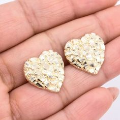 "3/4\" Heart Shaped Nugget Textured Stud Earrings Real Solid 10K Yellow Gold * Metal : Real 10K Yellow Gold (Properly Stamped, 10K) * Condition : Brand New * Finish : Polished * Avg Weight : 3.15 grams * Length : 19mm = Just over 3/4\" * Width : 18.8mm = 3/4\" * Clasp/Bail : Push Back All of our items are brand new and are shipped with a gift box." 14k Gold Diamond Cut Heart Earrings, Gold Heart Earrings Diamond Cut Gift, Earrings Real, Herringbone Necklace, Mexican Jewelry, Stacked Jewelry, Luck Charms, Gold Shimmer, Gold Price