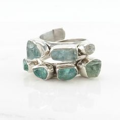 Stackable Sterling Silver Emerald Open Ring, Stackable Open Emerald Ring In Sterling Silver, Adjustable Aquamarine Gemstone Rings, Adjustable Multi-stone Blue Rings, Adjustable Blue Multi-stone Rings, Silver Multi-stone Aquamarine Rings, Silver Aquamarine Multi-stone Rings, Silver Stackable Emerald Open Ring, Silver Stackable Open Emerald Ring