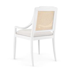 a white chair with wicker back and armrests, on a white background