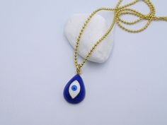 Fantastic Evil Eye Necklace, Greek Pendant, Blue Evil Eye Jewelry, Lucky Eye Gift, Greece Charm, Golden Greek Jewelry,Birthday Gift,Perfect Greek Gift It is a Unique and absolutely hand carved Bronze and Gold plated pendant necklace , inspired from Ancient Greek art. It is made by high quality of Bronze metal. Hand carved Greek Evil Eye . Each piece made by hand, with mini tools and hand tools ,as people has used in Ancient Greece. It is 100% Handmade. Feel proud to wear a real Greek hand carved Long necklace. -Antique Bronze -Gold plated -White Enamel -Dark Blue Enamel -Width: 12 mm / 0.47 inches -Height: 18 mm / 0.70 inches -Greek evil eye -Hand Carved -Handmade -Hand Engraved -Steel gold plated ball chain 1.5mm You can also enjoy all my Gold plated collection, here: https://www.etsy.com Handmade Blue Necklaces For Birthday, Spiritual Blue Jewelry For Birthday, Handmade Blue Jewelry For Birthday Gift, Spiritual Blue Jewelry For Birthdays, Blue Spiritual Necklaces For Party, Mini Tools, Evil Eye Hand, Greek Gifts, Ancient Greek Art