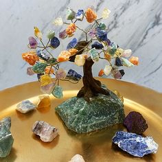 Looking for new ways to decorate your space? Our Feng Shui Crystal Trees make the perfect statement piece while subtly balancing out our energies. This tree contains the following crystals: Clear Quartz, Amethyst, Sodalite, Green Aventurine, Yellow Calcite, Orange Calcite & Citrine. Citrine Crystal Tree, Crystal Trees, Feng Shui Crystals, Colorful Gemstones, Energy Balance, Yellow Calcite, Orange Calcite, Crystal Tree, Energy Field