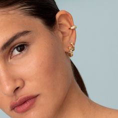 Delicate and fashion dainty ear cuff made to wear it at the lobe of the ear, no piercing needed, is made of 925 Sterling Silver 18kt gold plated with cubic zirconia gemstones. Details: * 925 Sterling Silver 18kt gold plated * Also available in 925 sterling silver.  * Nickel free * Sold individually * White Zircon  All jewellery comes in beautiful packaging, gift-ready. Made with love! Feel free to contact me with any questions :) Visit our e-shop http://www.bylia.es and take a look at By Lía ETS Party Huggie Single Earring, Elegant Sterling Silver Ear Cuff With Diamond Accents, Party Single Huggie Earring, Elegant Cubic Zirconia Ear Climbers, Elegant Tarnish Resistant Piercings, Elegant Huggie Cartilage Earrings With Diamond Accents, Gold Plated Single Ear Cuff Fine Jewelry, Gold Plated Ear Cuff Fine Jewelry, Trendy Cubic Zirconia Single Cartilage Earring