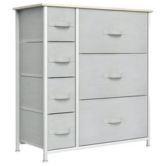 a white dresser with four drawers and two doors