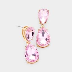 Pink Crystal Double Teardrop Gold EarringsItem: EarringsVendor: Sparkle ArmandColor : Pink, Gold Size : 0.5" W, 1.25" L Fastening: Post BackMetal: Alloy, Lead & Nickle FreeMaterial: Crystal teardrop Theme: Evening, Prom, Pageant, Bridal Pageant Jewelry, Pageant Earrings, Circle Earrings, Pink Crystal, Huggies Earrings, Teardrop Earrings, Long Earrings, Pink Gold, Earings Piercings