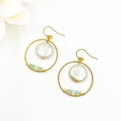 Invoke the mystery of the moon with these Moon Paradise earrings. This coin pearl's textured surface glows like the full moon on its brightest night. Style these up to feel like the legendary Chinese Goddess of the Moon, Chang'E, or dress them down for an everyday look. They're so versatile! In the Divine Land, Chinese people believe that life has a celestial origin. May these earrings remind you to never forget from whence we came.  Perfect accessory for celebrating the Chinese New Year! Style Moonstone Earrings With Moon Charm, Elegant Moonstone Earrings With Moon Charm, Chinese Goddess, New Year Style, Goddess Of The Moon, Gold Chandelier Earrings, Chinese Vintage, Chinese People, Porcelain Earrings