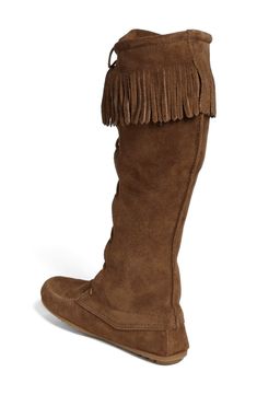 A fringed cuff tops a hand-sewn boot finished with rawhide laces. Style Name:Minnetonka Lace-Up Boot. Style Number: 137031_1. Available in stores. Bohemian Suede Boots With Tassels, Bohemian Leather Boots With Fringe, Western Suede Boots With Tassels, Bohemian Suede Boots With Fringe, Leather Fringe Boots For Rodeo, Bohemian Suede Winter Boots, Bohemian Winter Suede Boots, Bohemian Suede Fringe Boots, Bohemian Style Fringe Suede Boots