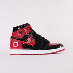 Debuted in 1985, the Air Jordan 1 Patent Bred offers a rendition to the iconic classic. Released December 30th, 2021. * Encapsulated Air Sole * Genuine patent leather in the upper offers durability * Air Jordan ball and wings logo on side * Black toe colour blocking Size and Fit* Fits true to size Nike High-top Jordan Shoes With Rubber Sole, Leather High-top Sneakers With Red Sole For Streetwear, Leather Jordan Shoes With Boost Midsole For Streetwear, High-top Leather Jordan Shoes For Streetwear, Jordan Mid-top Shoes With Red Sole For Streetwear, Nike Jordan Leather Shoes With Rubber Sole, Custom Low-top Patent Leather Sneakers With White Sole, White Sole Leather Jordan Shoes For Streetwear, Leather Jordan Shoes With White Sole For Streetwear