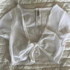 Sheer Forever 21 White Top Size S. Never Worn !! Sheer Summer Tops For Day Out, Sheer Tops For Summer Day Out, Sheer Tops For Beach Season, Trendy Fitted Tops For Beach Party, Fitted Tops For Summer Beach Party, Fitted V-neck Tops For Beach Party, Forever 21 V-neck Crop Top For Summer, Forever 21 V-neck Summer Crop Top, Sheer Chic Crop Top For Summer