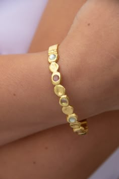 -18k gold plated hinged delicate bracelet with 6 stones and 6 gold molten coins -Measures 2.5" -Handmade in Brazil -18k gold plated over brass -Please note that our brand uses natural semi-precious stones-each piece has a unique texture, shine, and color. Boujee Jewelry, Minimalist Jewlery, Aqua Jewelry, Delicate Gold Jewelry, Jewelry Stones, Jewelry Brands, Dope Jewelry, Jewelry Essentials, Stacked Jewelry