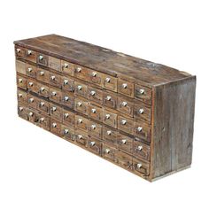 an old wooden chest with lots of drawers