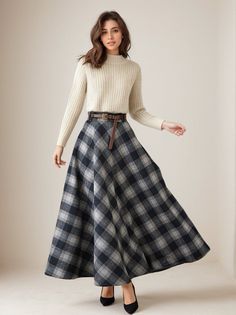 This winter wool skirt is a classic piece of tailoring that will see you through rain or shine. It is cut with a flattering flared skirt to give you a wonderful shape. The winter skirt is perfect classic styling and ends at the ankle. This is a versatile skirt that you'll wear again and again. DETAILS: * 30% wool, 30% fiber, 40% polyester * fully satiny liner * Two side pockets * Right zip closure * has belt loops to keep everything in place * back elastic band to provide some stretch * Plus size full skirt, warm thick winter skirt * Ankle length skirt * Perfect for Winter, autumn * Lean More about the items From the FAQs on the page bottom * The model is 170 cm (5′ 7″) tall with a 80 cm (31.5") bust, 66 cm (26") waist. She is wearing the wool plaid skirt in size XS. CUSTOM MADE SERVICE If Skirts In The Winter, Long Wool Skirt, Plaid Skirt, Christmas Skirt, Brown Tweed, Ankle Length Skirt, Winter Skirt, Wool Clothing, Wool Skirts