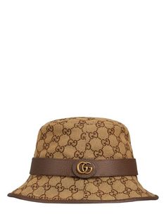 Gucci Bucket Hats, Mens Bucket Hats, Versace Brand, All Over Pattern, Ski Accessories, Gucci Monogram, Gg Logo, Buy Gucci, Metal Logo