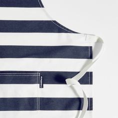 the apron is striped with white and blue stripes