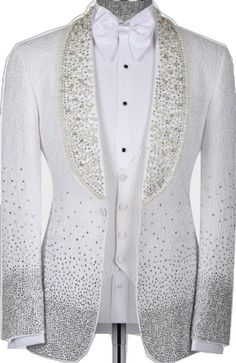 a white tuxedo with sequins on the lapel and collarline