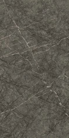 a black marble textured wallpaper with grey veining and white lines on it