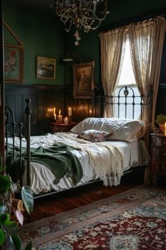 a bed sitting in a bedroom next to a window with curtains on the windowsill