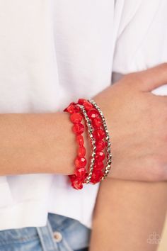 Pacific Picnic Red Necklace - Paparazzi Accessories Threaded along invisible wires, rows of faceted silver beads give way to opaque Poinciana gem-like beads below the collar for a summery splash of color. Features an adjustable clasp closure. Sold as one individual necklace. Includes one pair of matching earrings. Seaside Siesta Red Bracelet - Paparazzi Accessories Strands of faceted silver beads and opaque Poinciana gem-like beads are threaded along stretchy bands around the wrist, layering in Summer Adjustable Jewelry With Faceted Beads, Adjustable Faceted Beads Jewelry For Summer, Adjustable Jewelry With Faceted Beads For Summer, Red Faceted Beads Bracelet, Red Faceted Beads Jewelry For Party, Traditional Red Faceted Beads Bracelet, Red Summer Party Jewelry, Red Beaded Bracelets With Spacer Beads For Party, Summer Party Jewelry With Faceted Beads