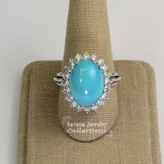 Beautiful Persian Turquoise diamond ring, it has not been stabilized. Brilliant round diamonds encircle the turquoise.Ring Size: 11Total Weight: 11.92 gramsPrecious Metal: PlatinumPrecious stones:-Sleeping Beauty Turquoise Center Stone: 16.4mm x 12.7mm-White Round Diamonds: 1.6 carats Turquoise Diamond Ring With Center Stone, Fine Jewelry Turquoise Ring With Center Stone, Turquoise Diamond Rings With Gemstones, Turquoise Diamond Rings With Center Stone, Fine Jewelry Turquoise Diamond Ring, Fine Jewelry Diamond Turquoise Ring For Anniversary, Luxury Turquoise Diamond Ring, Luxury Turquoise Anniversary Ring, Turquoise Blue Diamond Ring With Center Stone