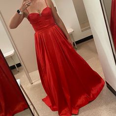 This Gown Is An Absolute Eye Catcher New Without Tags, Was Going To Wear For A Wedding But Decided On Something Different. It Was Final Sale So Couldn’t Return. Normally I’m Size Small/Medium And This Fit Perfect. Has Pockets Too Fitted Ball Gown For Red Carpet, Red Corset Back Dress For Prom Season, Red Corset Back Dress For Prom, Red Evening Dress For Prom Season, Sweetheart Neckline, Formal Full-length Gown With Corset Back, Red Dress With Lined Bodice For Prom Season, Red Sweetheart Neckline Dress With Corset Back, Red Carpet Satin Dress With Sweep Train, Red Floor-length Gown With Corset Back