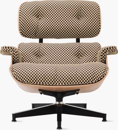 an office chair with checkered upholstered fabric on the back and armrests