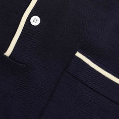 Elevate your style with our Tipped Cotton Sweater Polo in navy. Crafted from 100% mercerized cotton, this polo maintains its vibrant color and luxurious feel wash after wash. | Men's Tie Bar: Tipped Cotton Sweater Polo - S, In Navy, Cotton, Solid Fitted Navy Polo Sweater With Ribbed Collar, Navy Polo Shirt With Button Closure For Work, Navy Fitted Collared Polo Sweater, Fitted Navy Collared Polo Sweater, Blue Polo Collar Sweater For Work, Polo Collar Top With Contrast Trim For Work, Workwear Polo Collar Top With Contrast Trim, Workwear Top With Polo Collar And Contrast Trim, Elegant Cotton Polo Sweater For Work