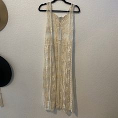 Nwt Women's Lace Sleeveless Duster B Y Woven Heart Size M Ivory Lace Sleeveless Duster Length 38" 65% Cotton 35% Nylon Beige Vest For Summer Daywear, Summer Lace Tank Top For Daywear, White Lace Tank Top For Spring, Cream Lace Sleeveless Camisole, Sleeveless Lace Trim Vest For Spring, Spring Beige Lace Tank Top, Beige Lace Tank Top For Spring, Beige Sleeveless Tank Top For Daywear, Cream Tank Top For Summer Daywear