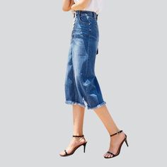 Make a bold statement this summer with the 2023 Spring-Summer Collection's distressed hem midi denim skirt! This 90s-style. medium wash. high-waist skirt features a drawstrings closure for a unique and edgy look.Why You'll Love Itââ‚?/strong> Grunge Galore: Inspired by the iconic '90s grunge movement. this skirt exudes an effortlessly cool attitude. Distinctive Distressed Pattern: Expertly crafted wear and tear. capturing a raw. unfiltered essence. Sleek Slim Fit: Designed to hug your silhouette Blue Knee-length Summer Jeans, Trendy Medium Wash Knee-length Bottoms, Trendy Knee-length Denim Bottoms, Trendy Knee-length Dark Wash Jeans, Trendy Dark Wash Knee-length Bottoms, Trendy Knee-length Denim Skirt With Frayed Hem, Dark Wash Denim Knee-length Bottoms, Spring Wide Leg Denim Skirt With Frayed Hem, Summer Cropped Leg Denim Bottoms