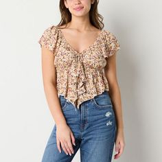 Add some boho chic pieces to your collection with this fresh Arizona women's and junior's floral-print blouse. This fitted floaty top has a plunging v-neckline, short flutter sleeves and a large ruffled panel on the front. Wear it with skinny jeans and wedge heels. Closure Type: Pullover HeadFit: FittedNeckline: Open NeckSleeve Length: Short SleeveSleeve Style: Flutter SleeveApparel Length: 11 InchesFiber Content: 100% RayonFabric Description: DobbyCare: Machine Wash, Tumble DryBody Type: Hourgl Multicolor V-neck Tops With Ditsy Floral Print, Summer V-neck Blouse With Ditsy Floral Print, Feminine Floral Print Short Sleeve Crop Top, Feminine Short Sleeve Floral Print Crop Top, Chic Floral Print Crop Top For Spring, Fitted Ditsy Floral Print Tops For Spring, Summer Fitted Blouse With Ditsy Floral Print, Fitted Summer Blouse With Ditsy Floral Print, Printed Short Sleeve Crop Top For Spring